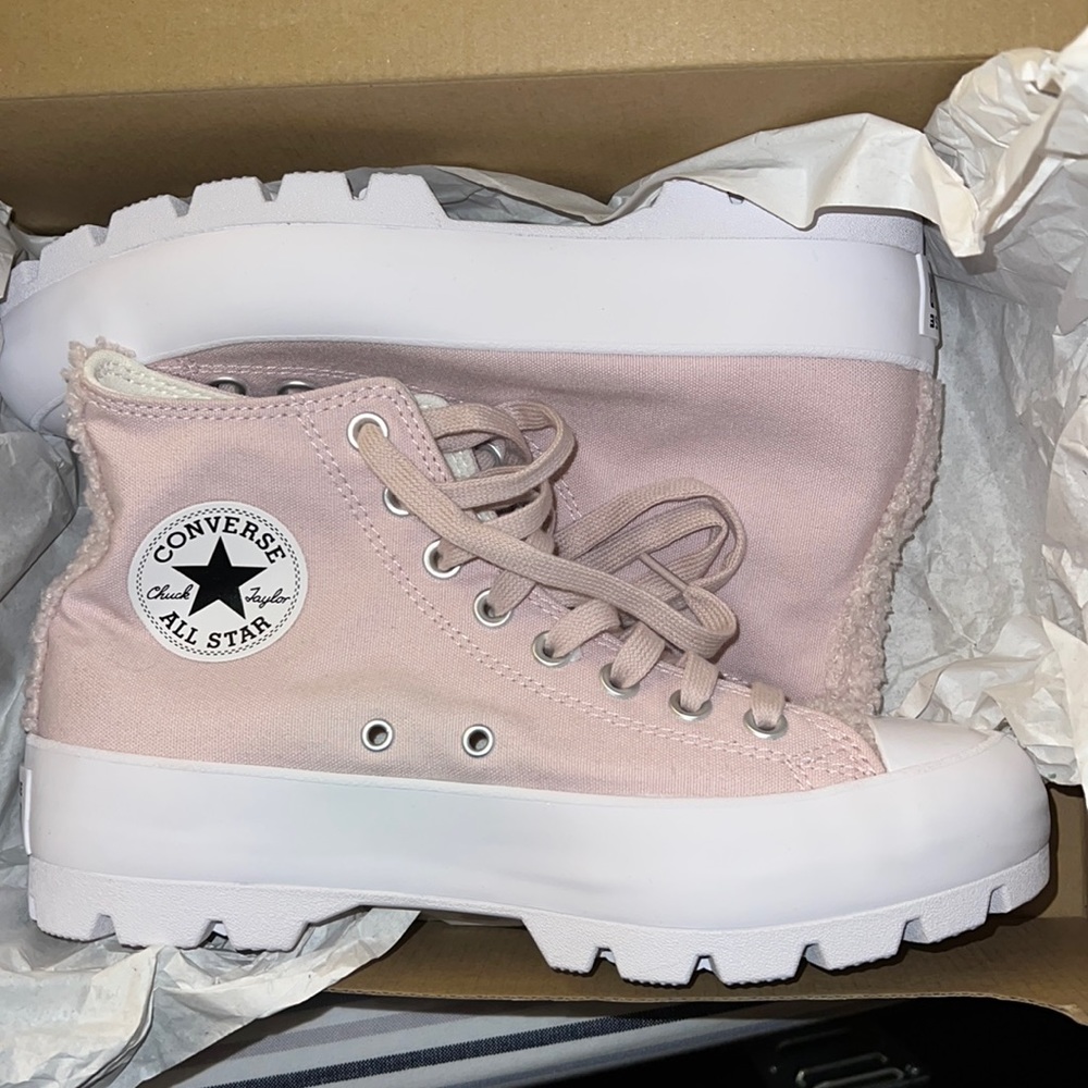 Women’s size 9 Pink fur Hightop Converse. Brand New and never worn!